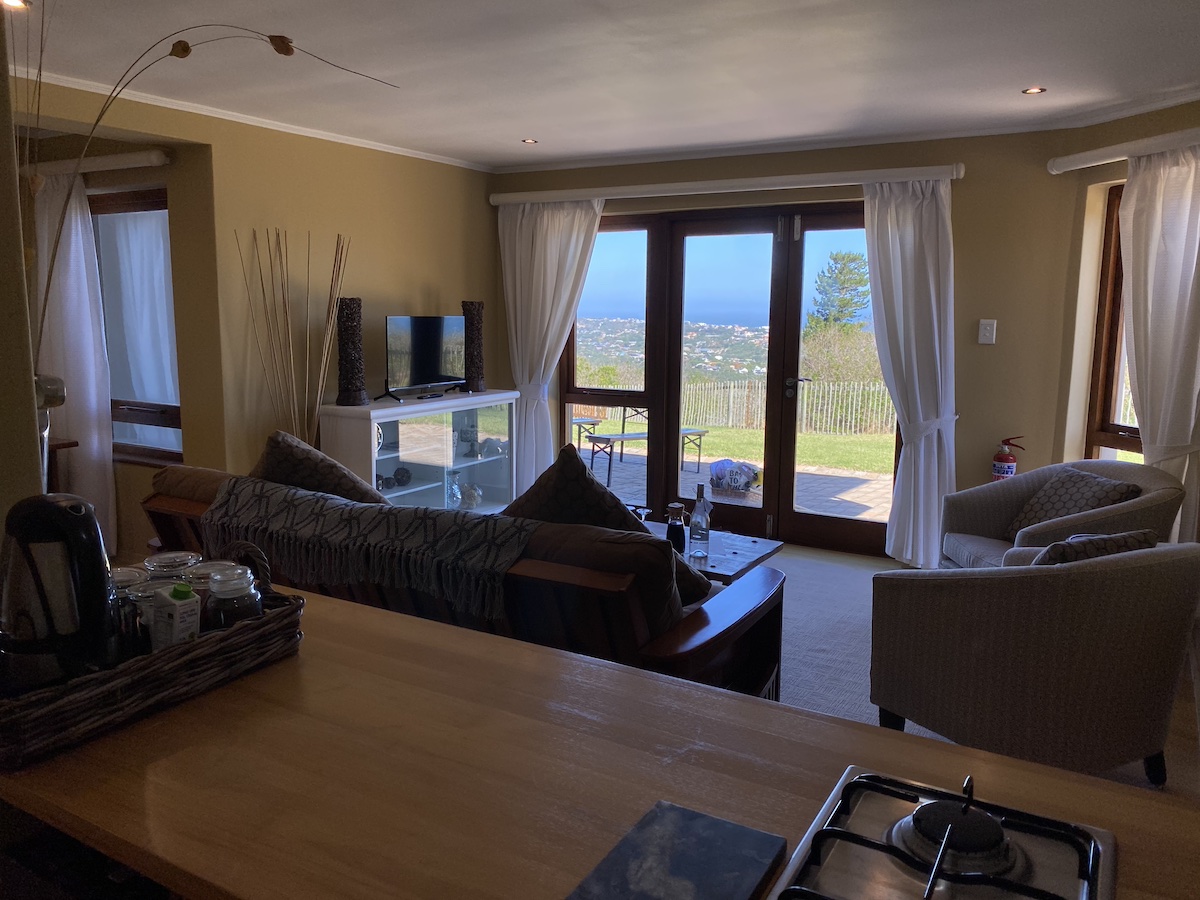 Across the kitchen counter to the lounge and sea view